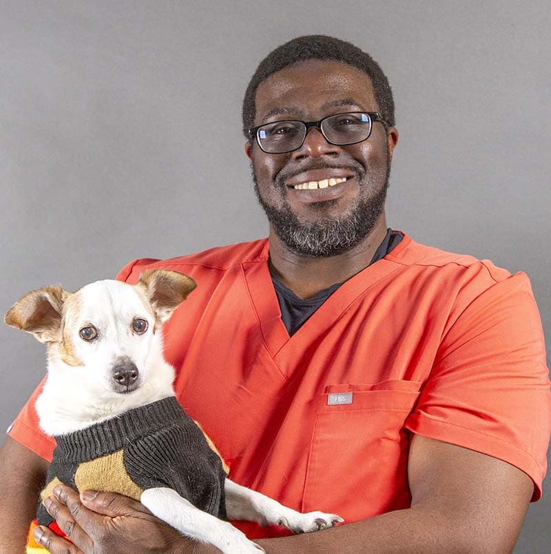 Dr. Jeremy with a Dog